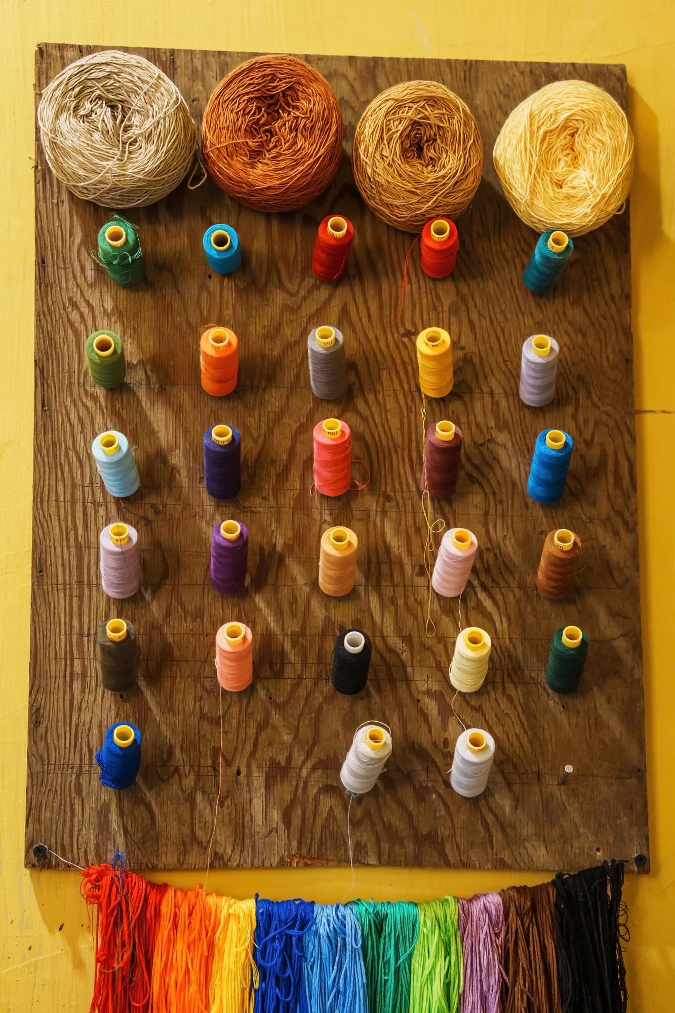 Assortment of embroidery threads in warm tones